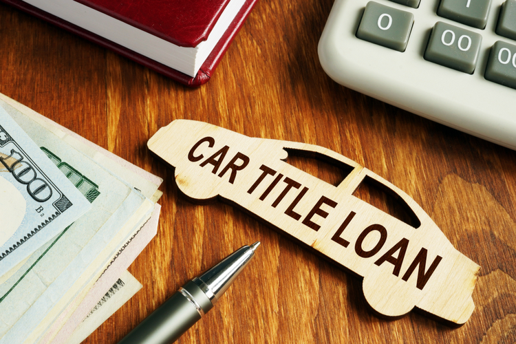 cash and car title loan written on car