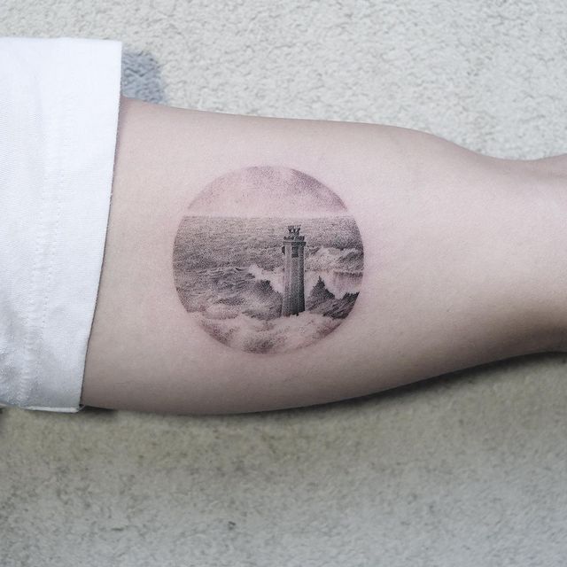 detailed dotwork tattoo of a lighthouse