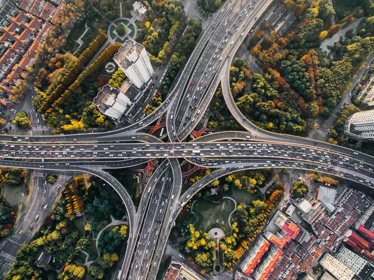 Aerial photo of a very large intersection with landscaped park