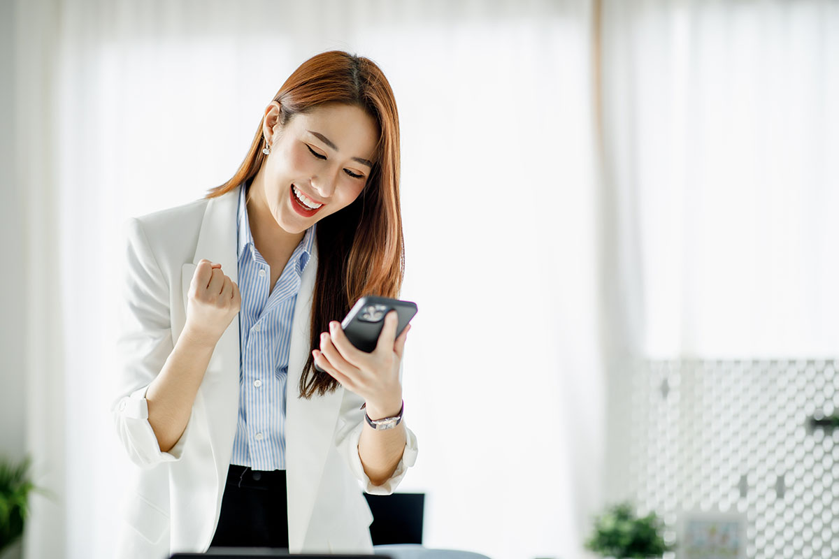 woman excited to get payday loan over the phone
