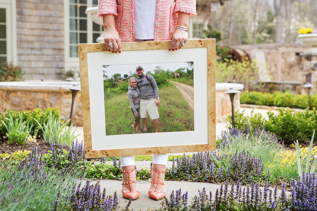 Large photo of a man and a woman in large burlwood frame