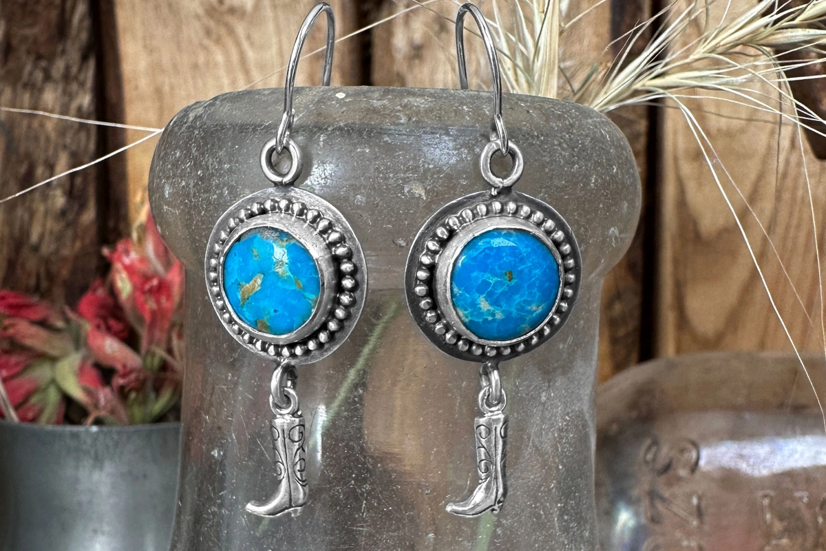 earrings with turquoise and a cowboy boot dangle
