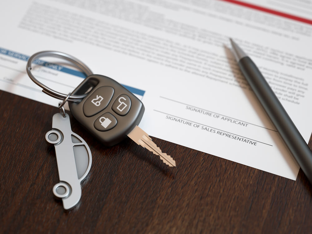car keys with paperwork for car title loan