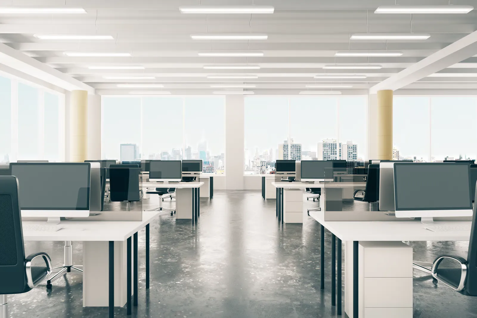 Empty office space showing reduced overhead costs through remote work models