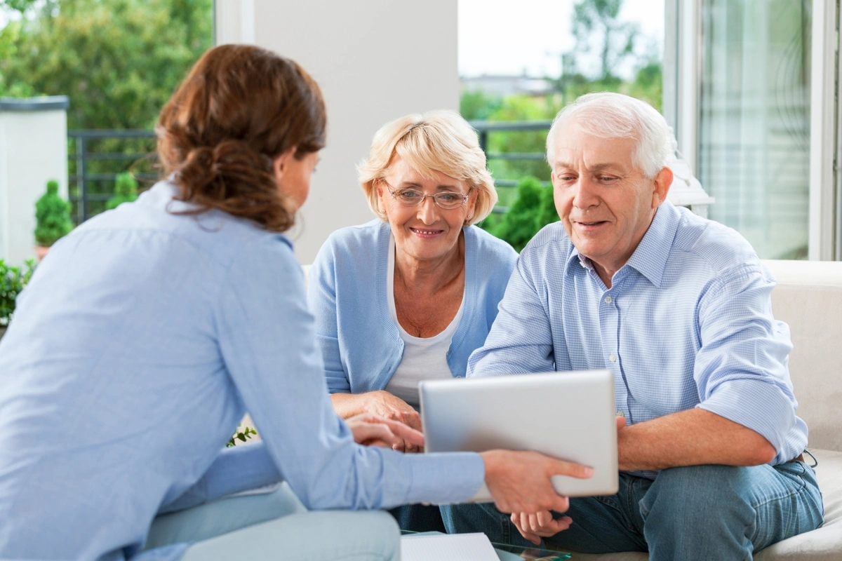 local insurance agent helping couple with Medicare