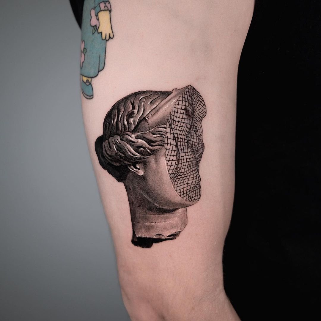 black and grey tattoo by dani sanz