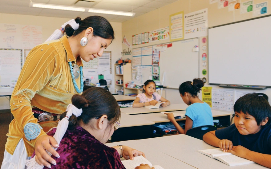 Indigenous Navajo students in an elementary school classroom