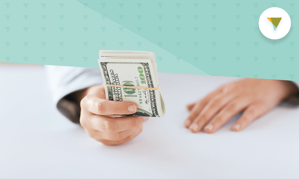 Hand holding money