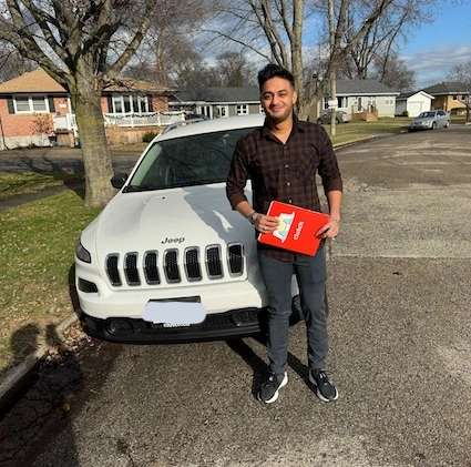 review author with their recently purchased car