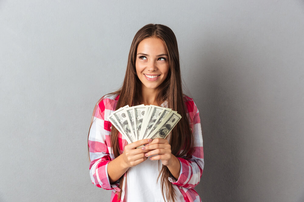 Girl happy about online loan cash
