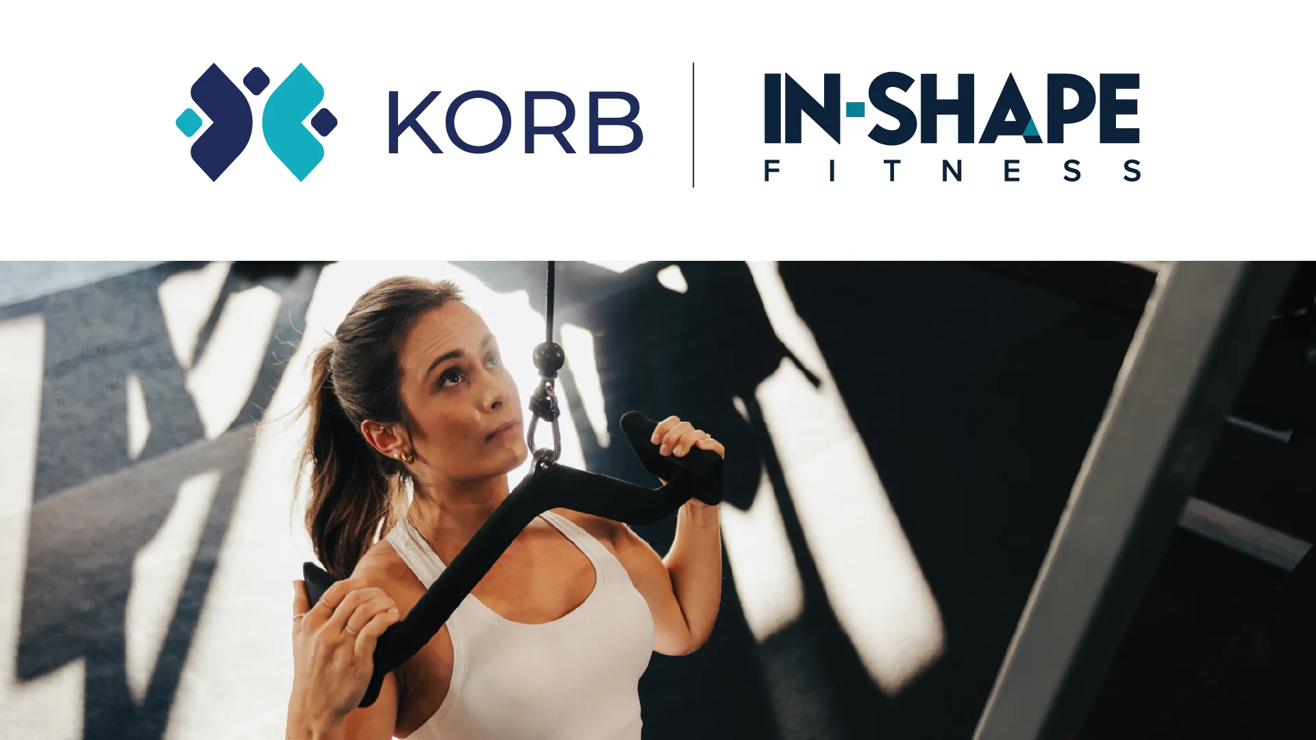 KORB + In-Shape Fitness - woman performing a cable lat pulldown