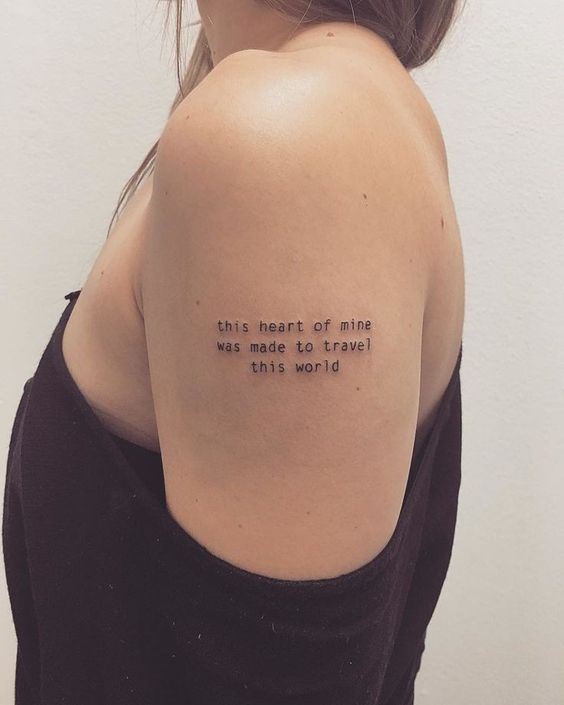 quote tattoo on woman's arm