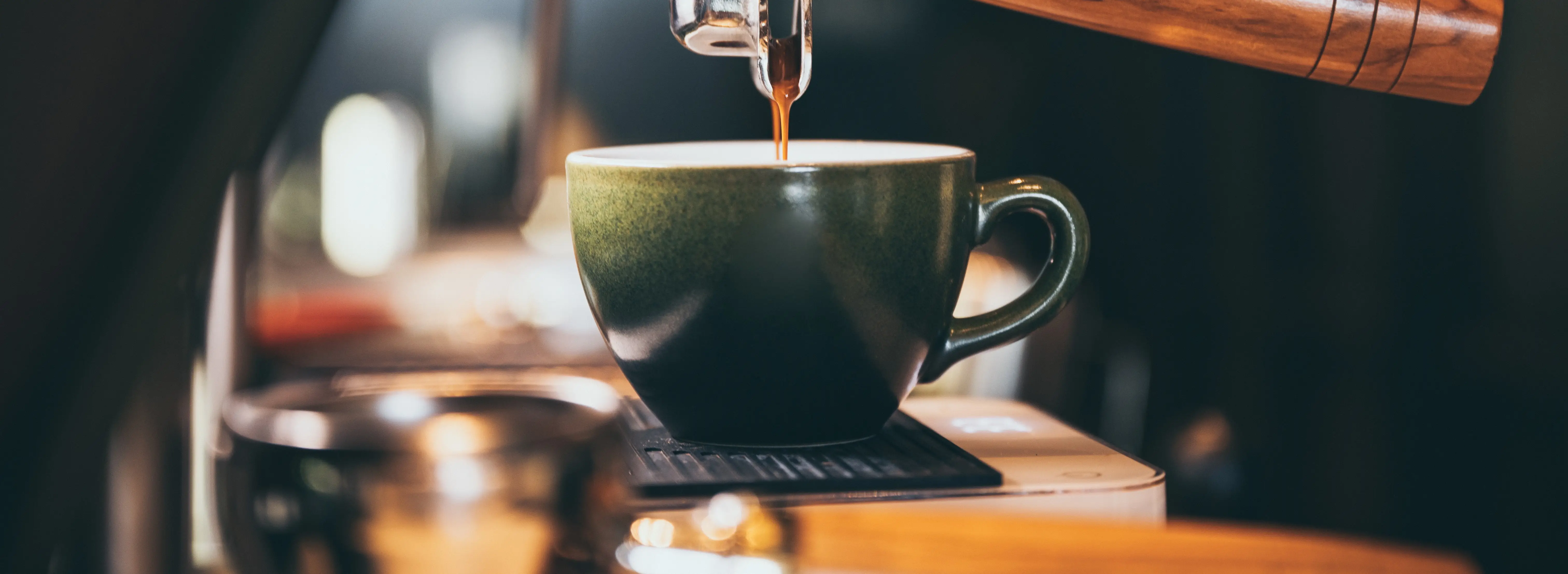 Fresh espresso being prepared as part of morning work routine