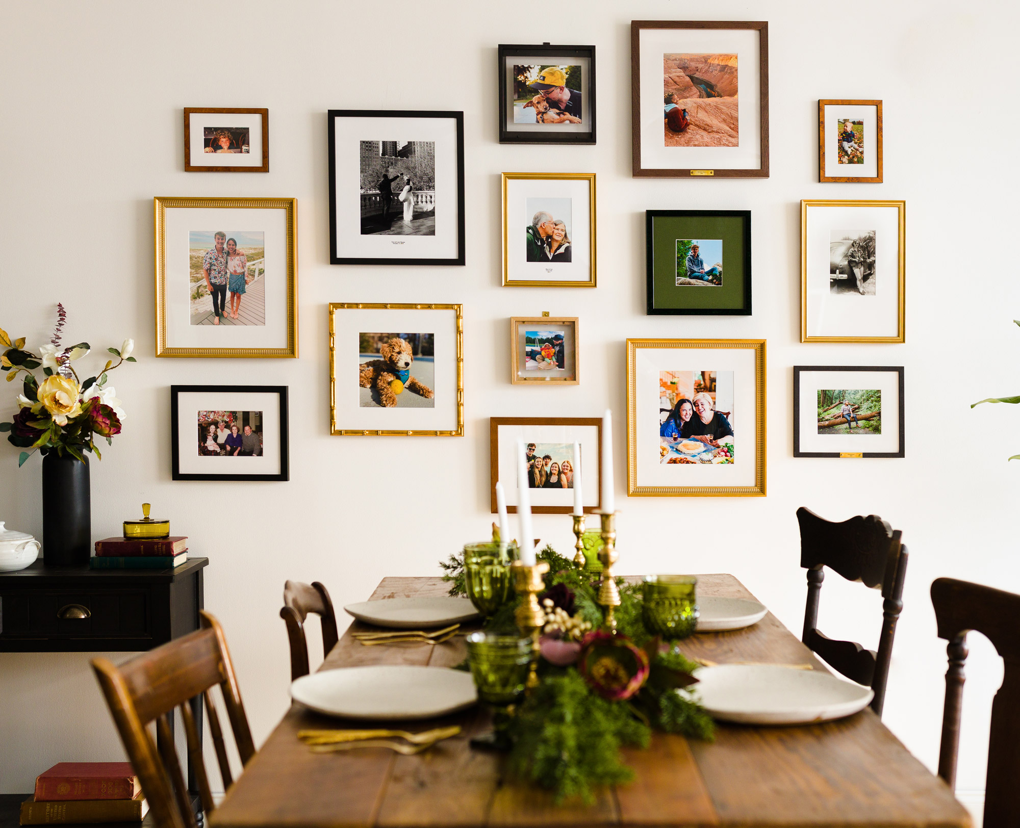 gallery wall in front of holiday table