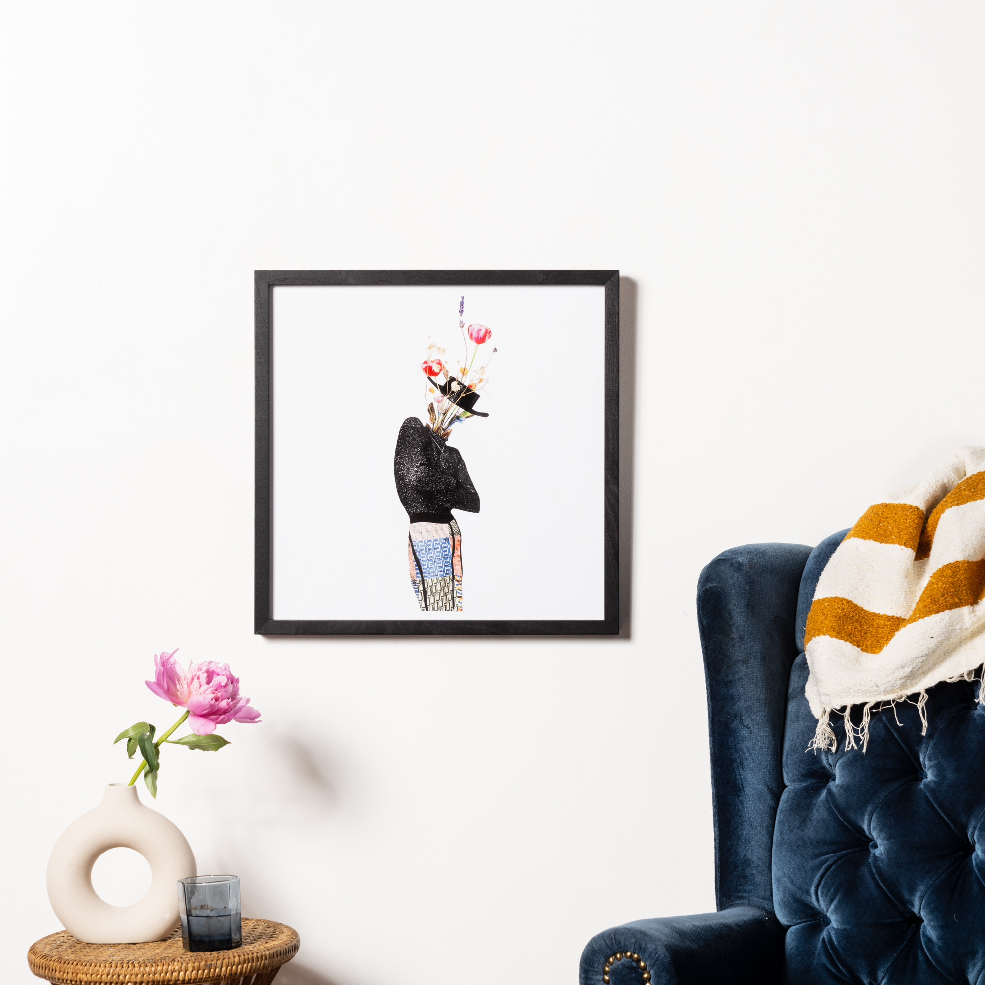 flower and figure silhoutte in black frame