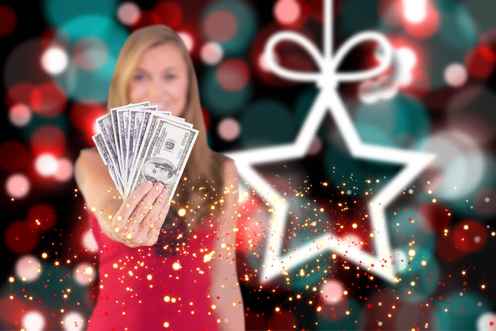 woman with christmas cash for car title