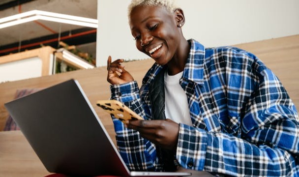 A person confidently uses secure devices to access the internet.