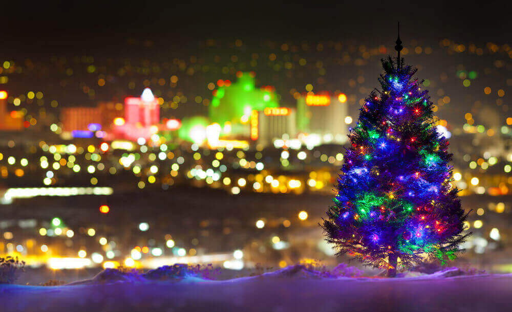 christmas tree overlooking city of lights