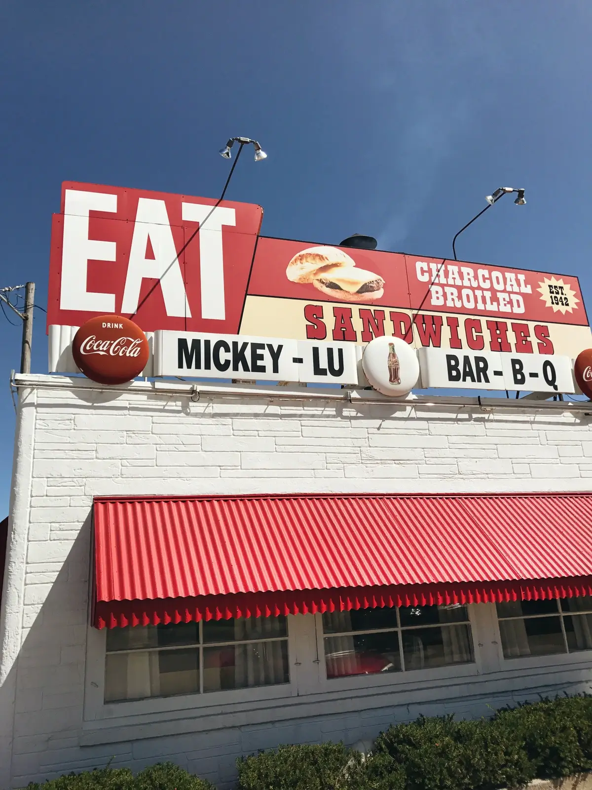 Restaurant with large red signs