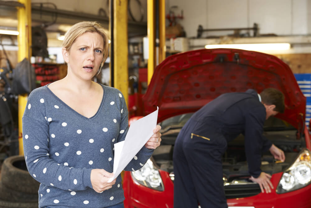 Woman wondering how to pay for car repairs with no money