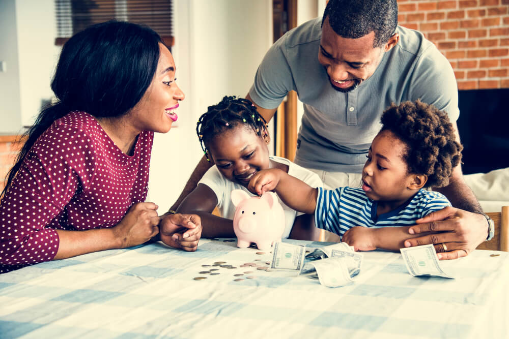 Family learning how to save money while repaying loans