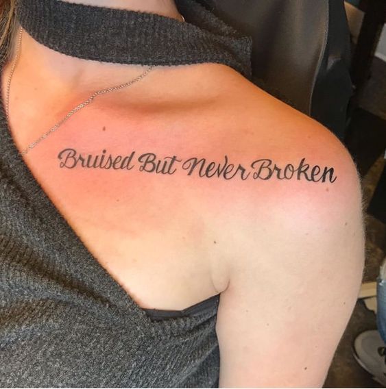 quote tattoo on woman's shoulder