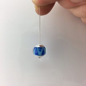 Stringing glass beads on a headpin