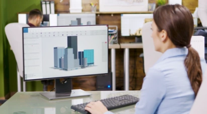 Female architect working on computer