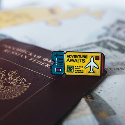 Adventure awaits pin.