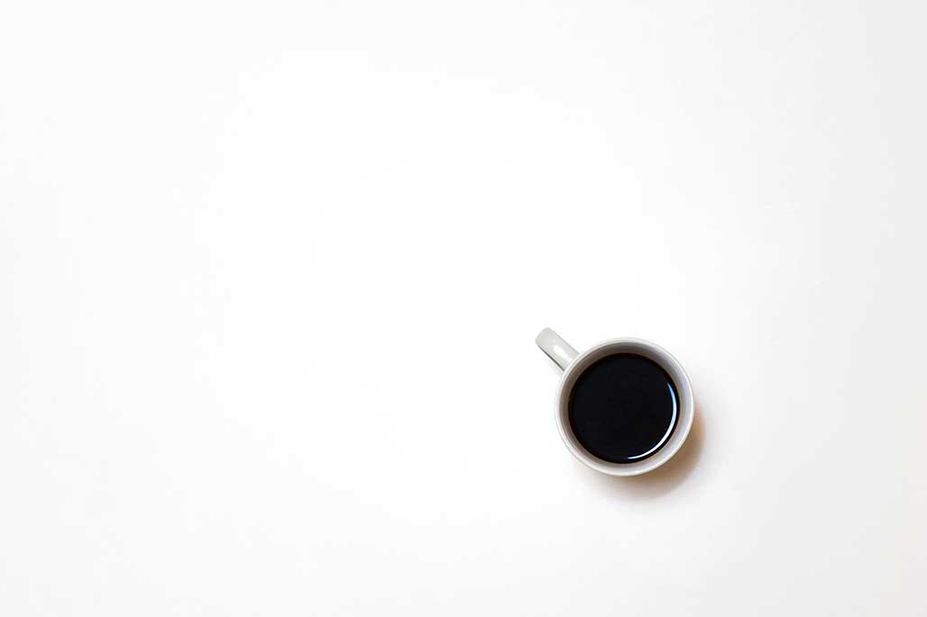 CoffeeinWhiteCup-IsaacBenhesed-Unspla...