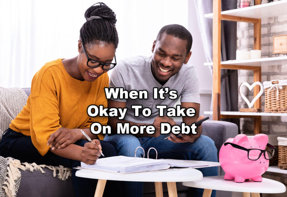  A black couple calculates their finances together.