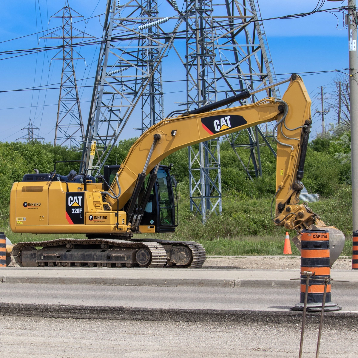 Excavator doing road work