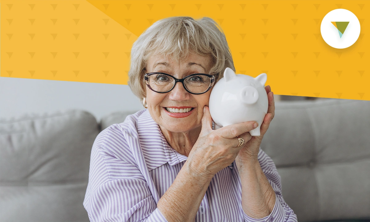 senior-lady-with-piggy-bank.webp
