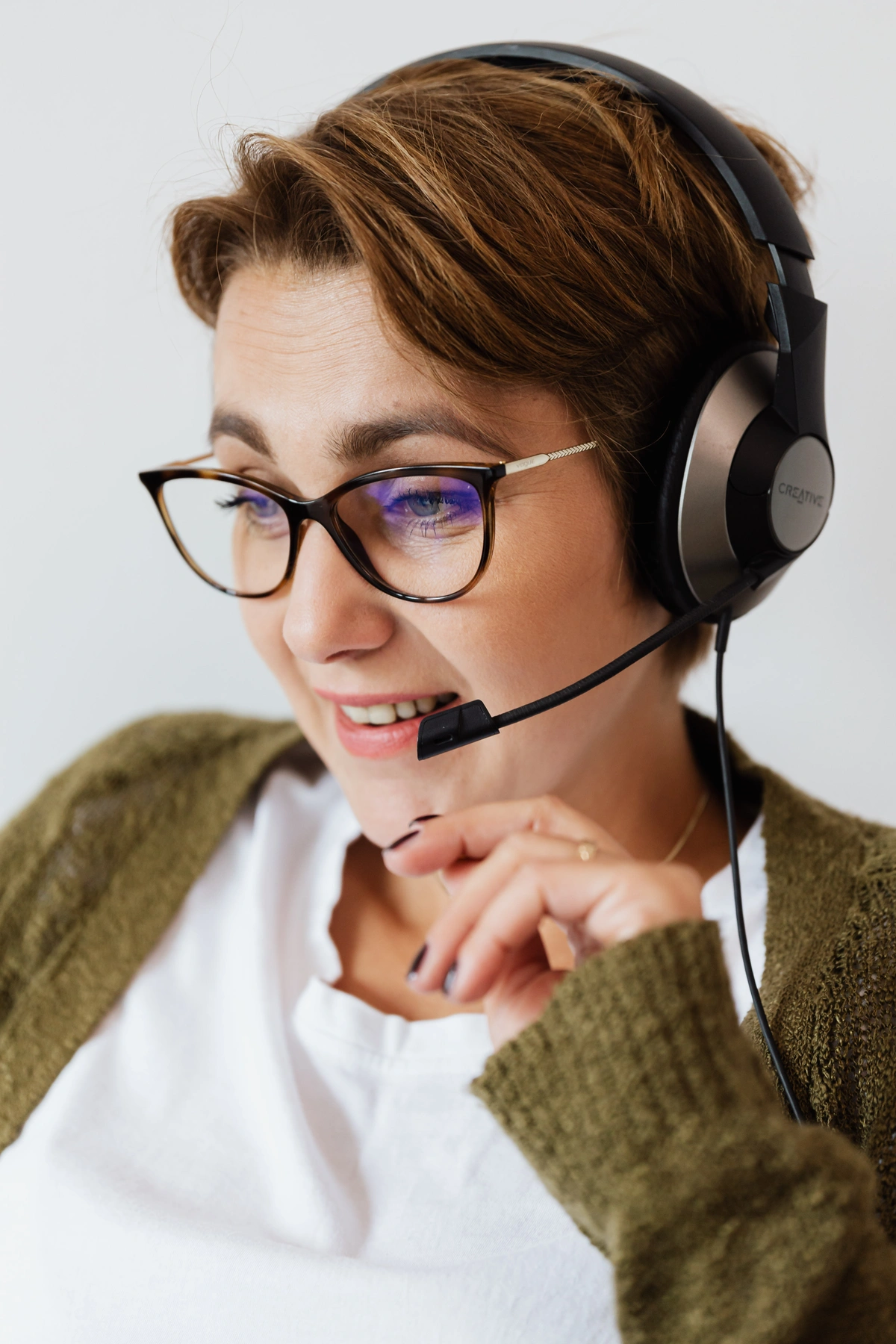 Telemarketer talking on phone.