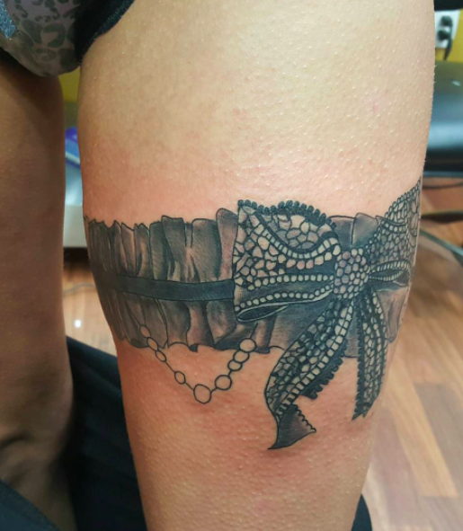 Garter bow outlet tattoo