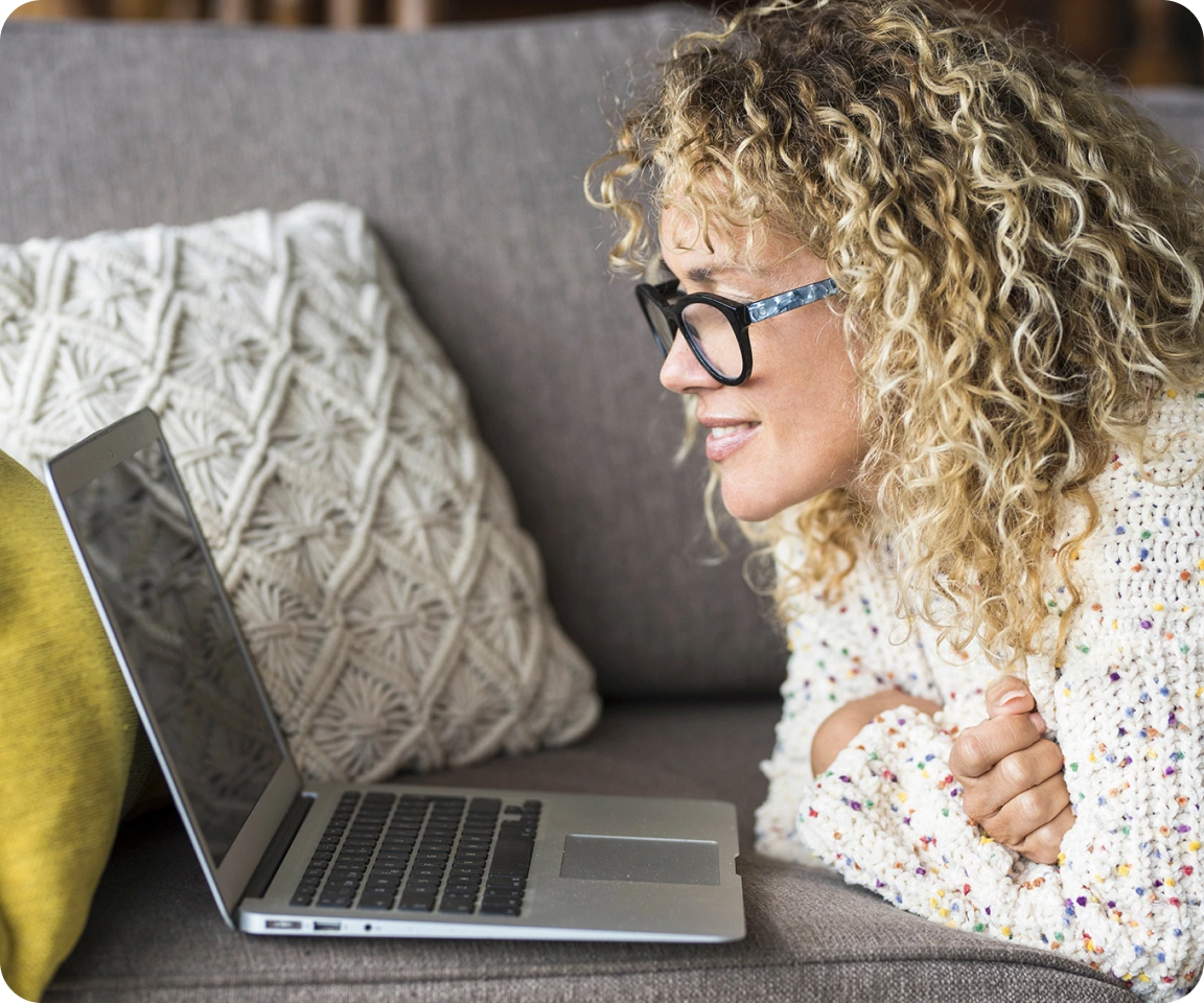 Woman watching laptop