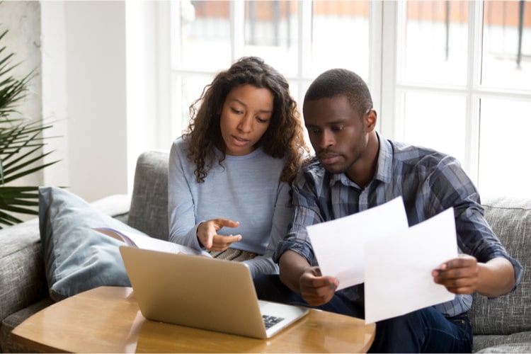 couple thinking of auto title loan