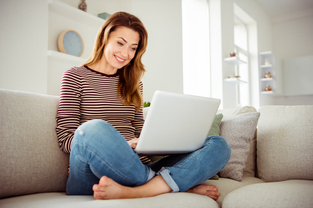 woman getting a title loan online to pay electric bills
