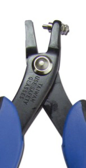 Pliers for punching holes in metal blanks