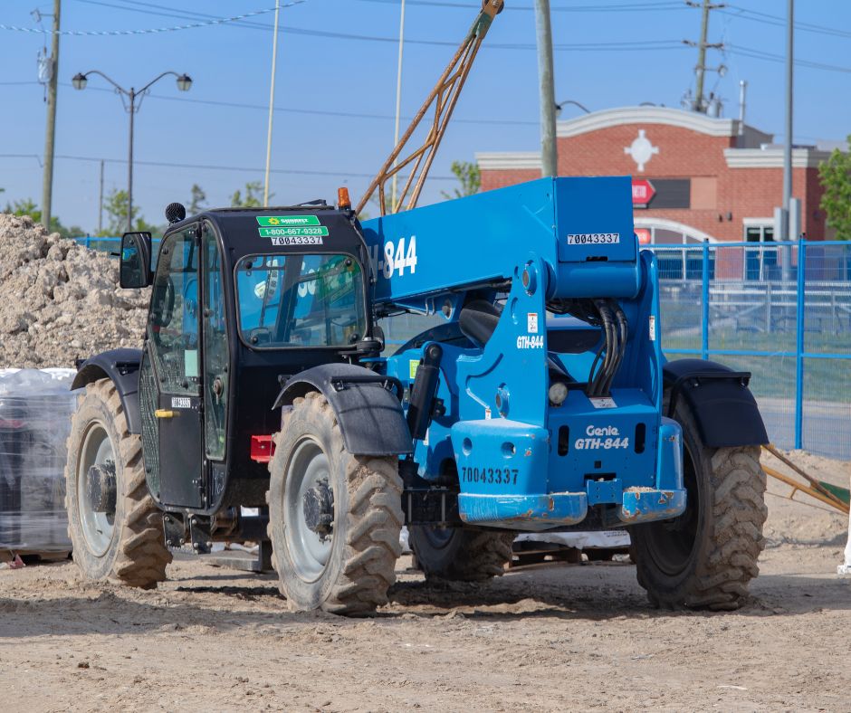 Genie GTH-844 driving around a project