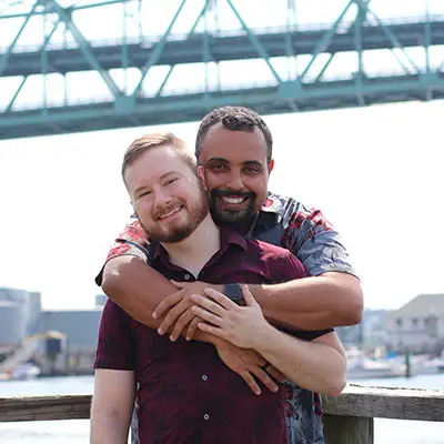 Gay couple travel portrait taken in New York.