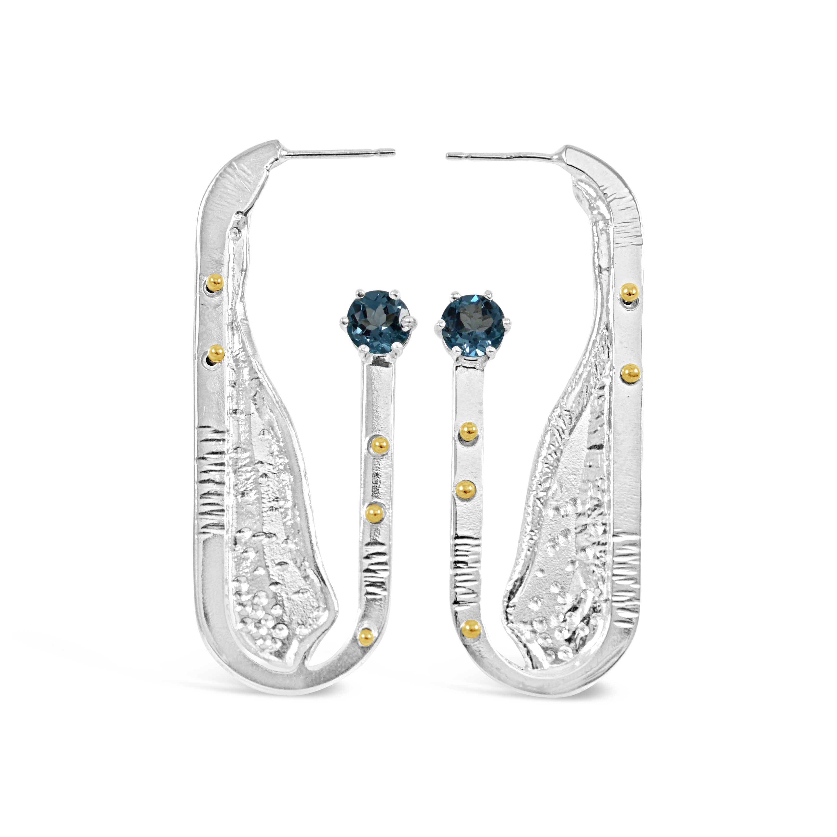 Earrings with blue stones by Kristen Baird