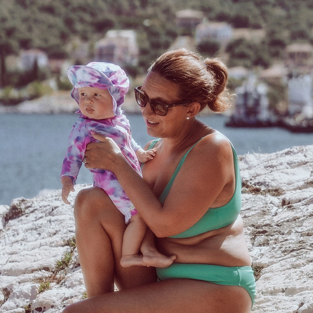 Baby and mom at beach.webp