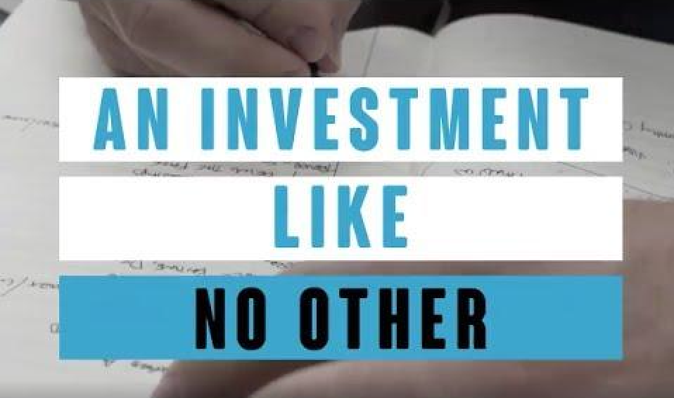 Text "An Investment like no other" with close up of man writing with pen