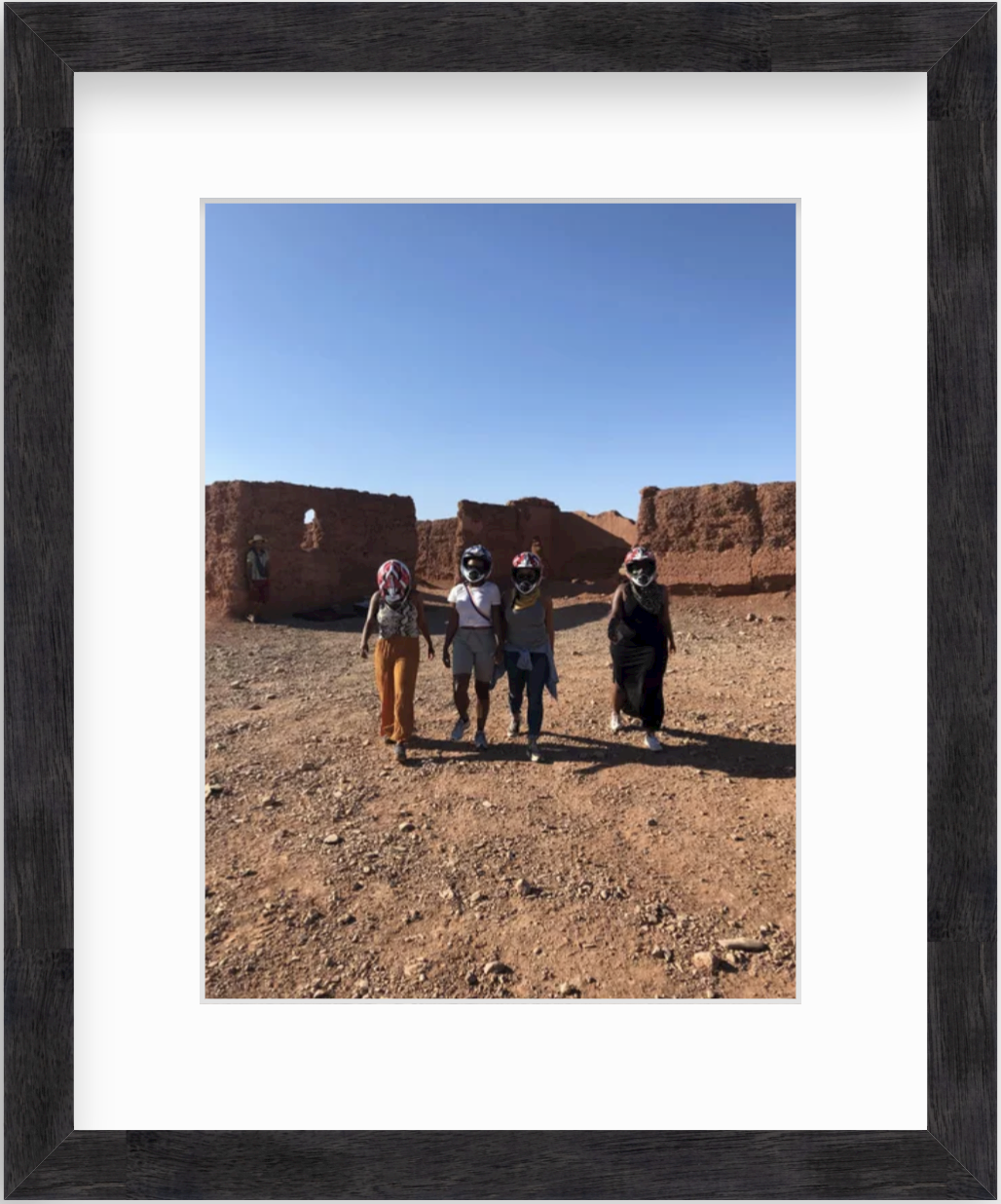 framed photo of four women in morocco