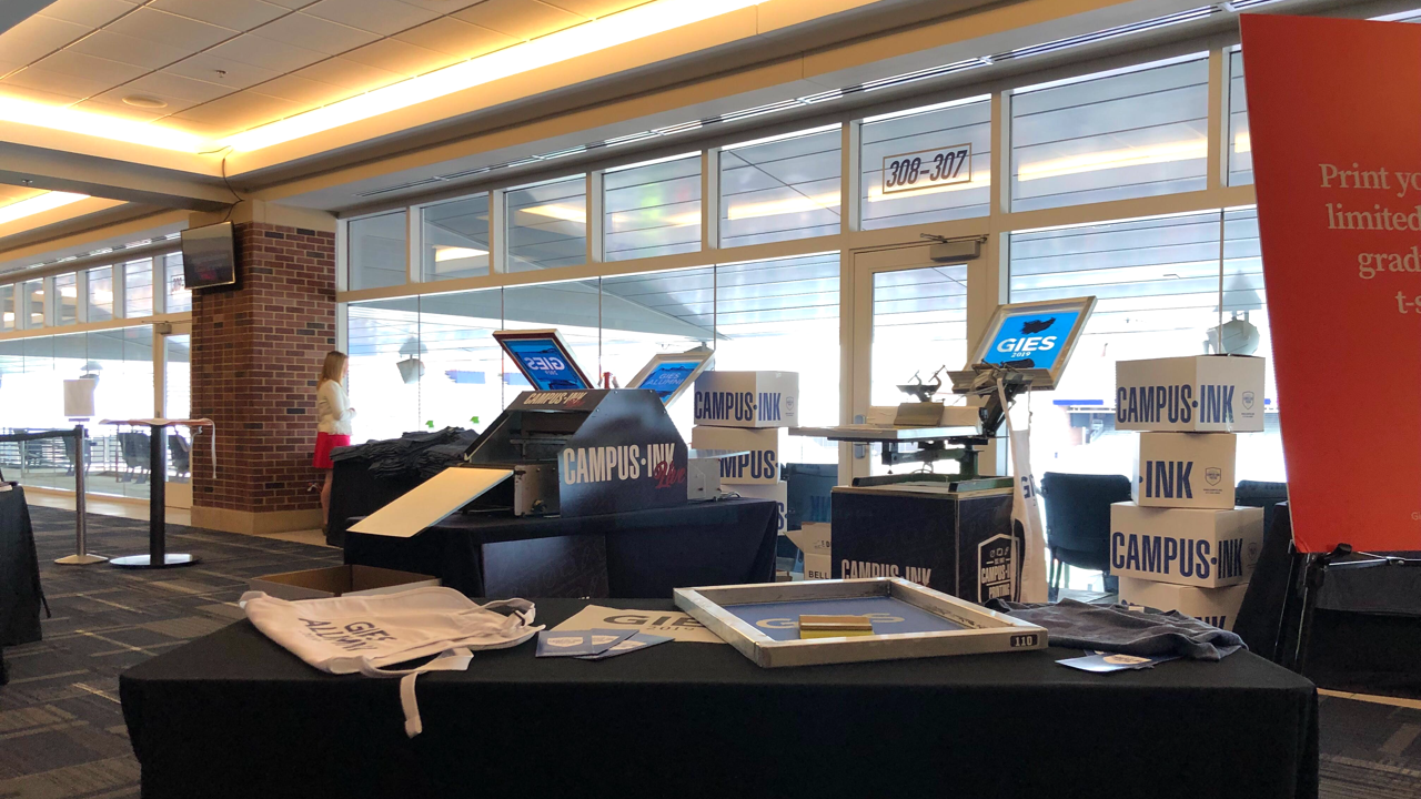 A live screen printing setup at University of Illinois' 2019 graduation ceremony