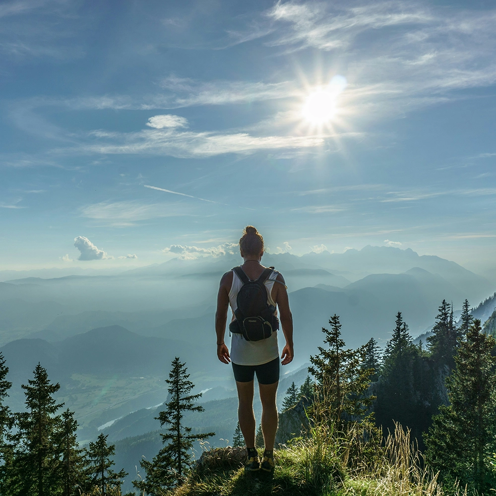 Man Hiking a Jesenice Mountain.webp