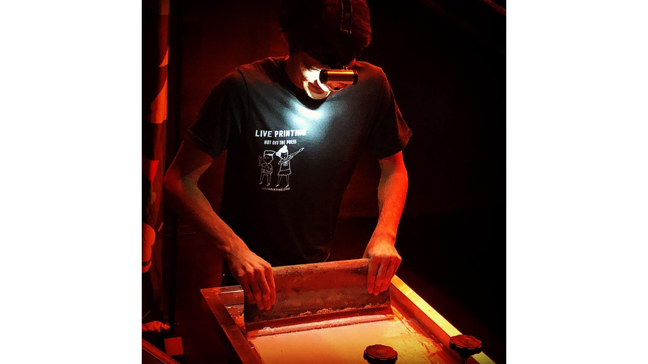 Live screen printing (in the dark) with a headlamp on.