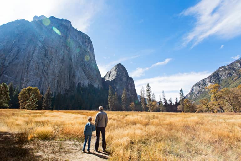 Dad and young son on hike