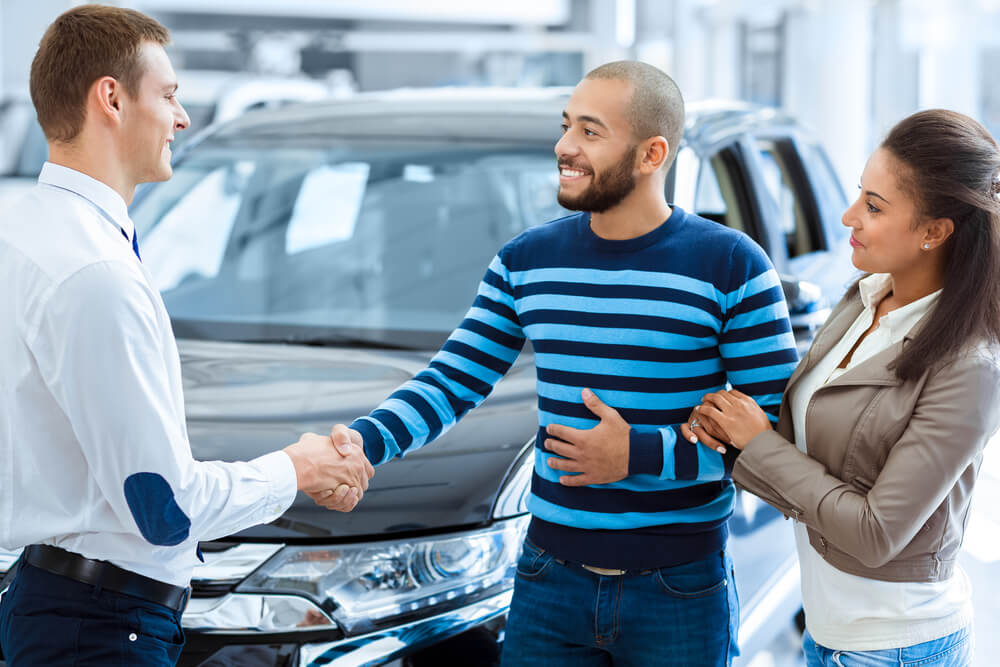 buying a car from a dealer after title transfer